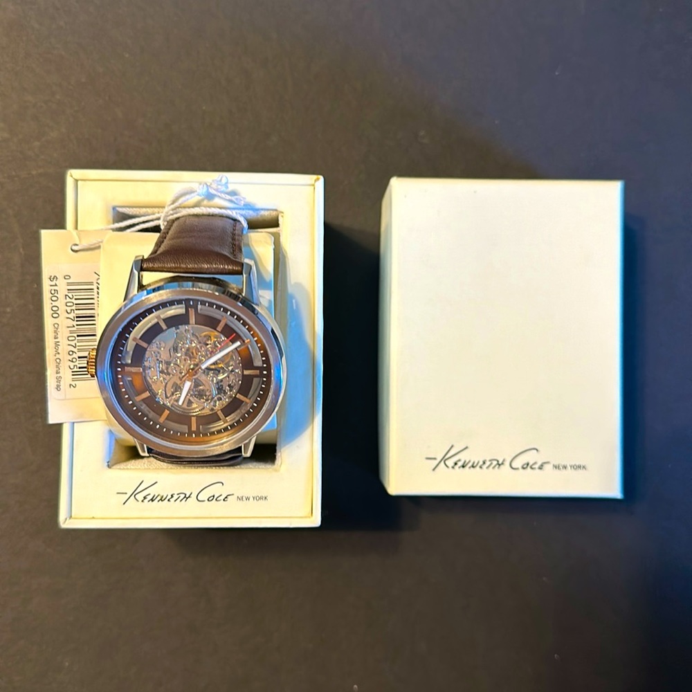 Kenneth Cole men’s brown leather strap watch.NY AUTOMATIC SILVER DIAL SKU:KC1718